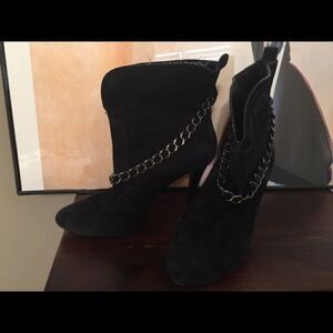 Black booties, used. Needs new heel plate.